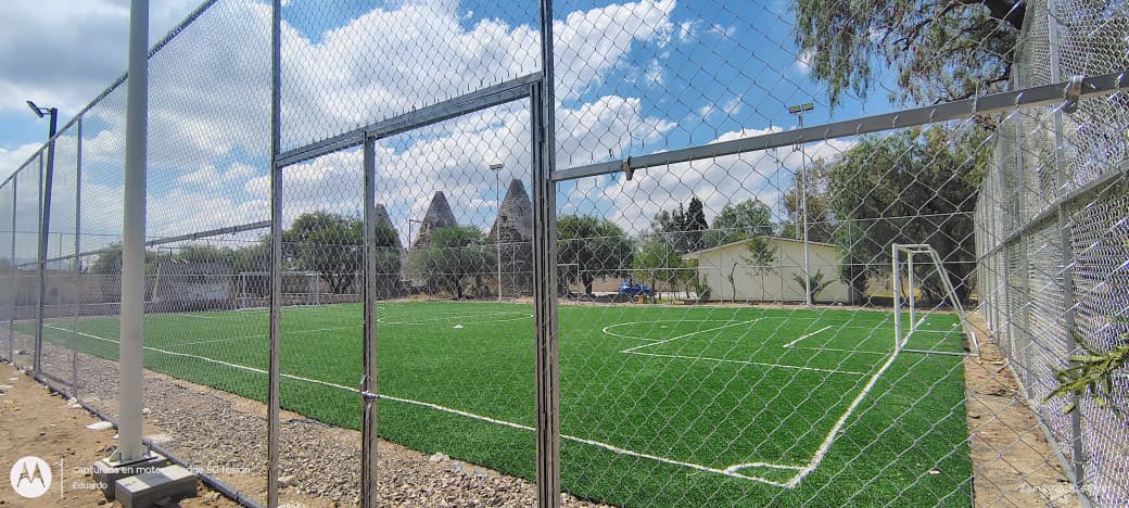 CONSTRUCCIÓN DE CANCHA FÚTBOL 5 EN SANTA ROSA EN EL LLANO