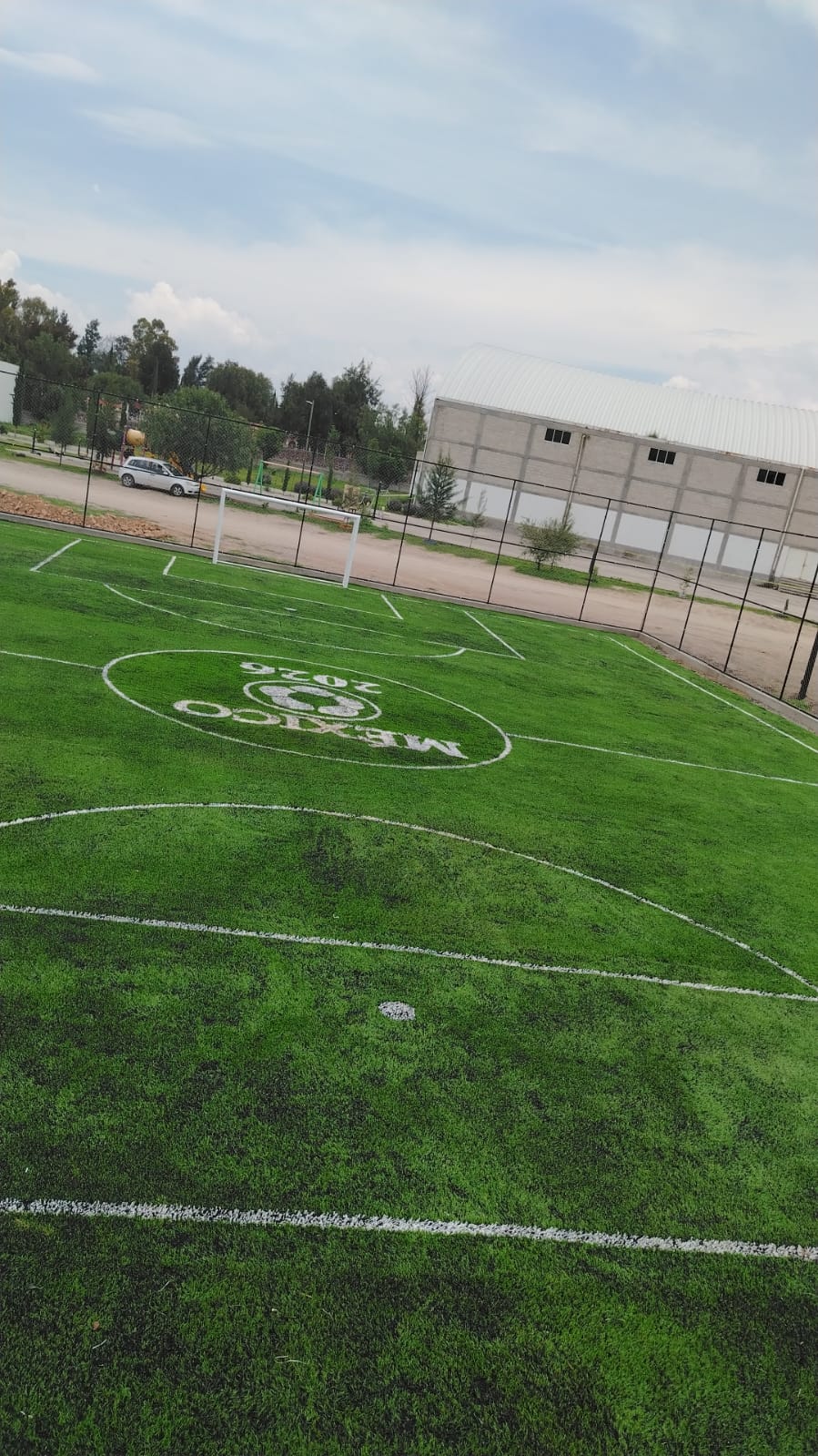 CONSTRUCCIÓN DE CANCHA FÚTBOL 5 EN  CAMPO TRINIDAD OLGUÍN EN TLAHUELILPAN