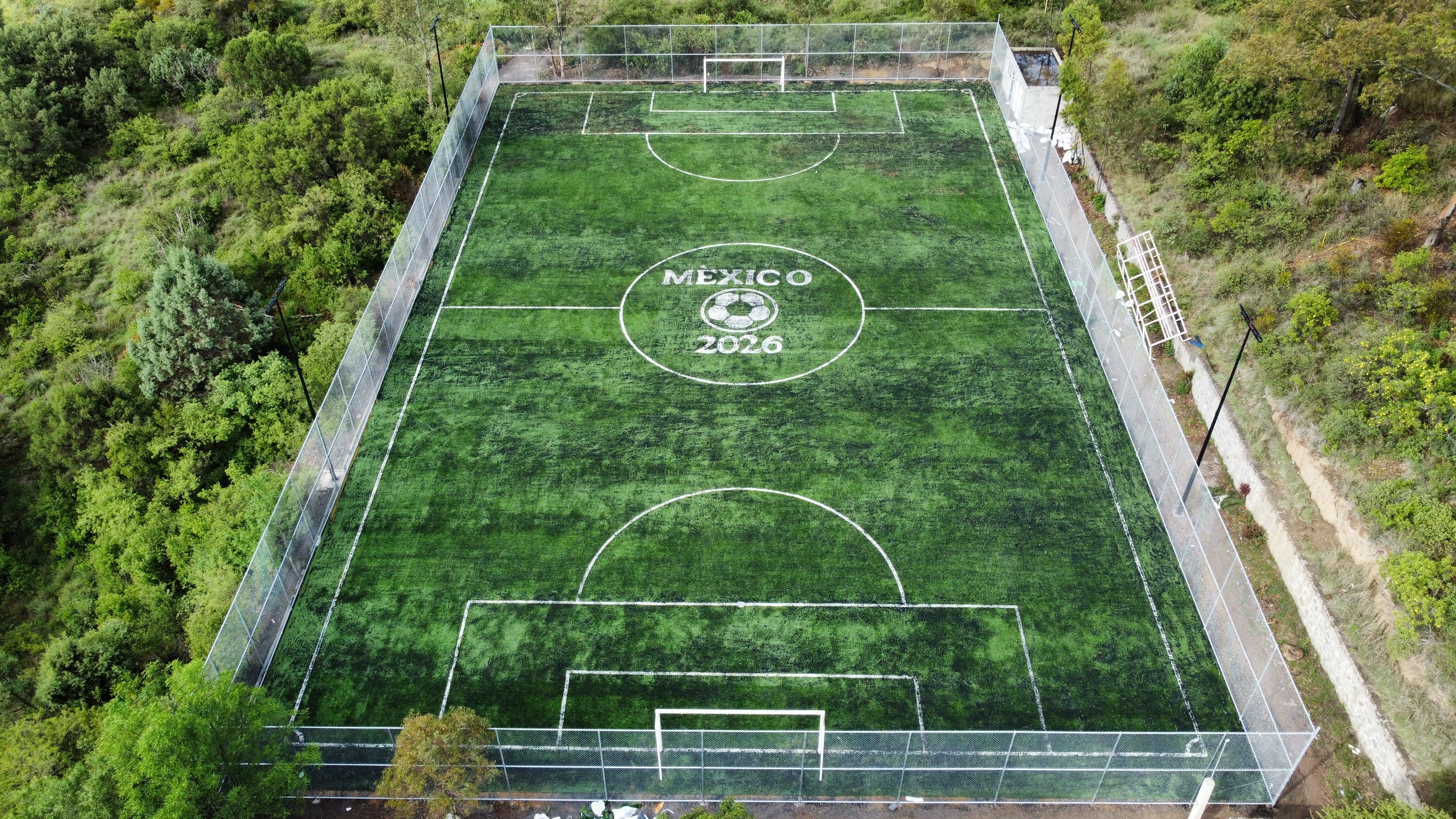 CONSTRUCCIÓN DE CANCHA DE FÚTBOL 7 EN UNIDAD DEPORTIVA DE LA COMUNIDAD DE LA TRINIDAD TENEXYECAC 