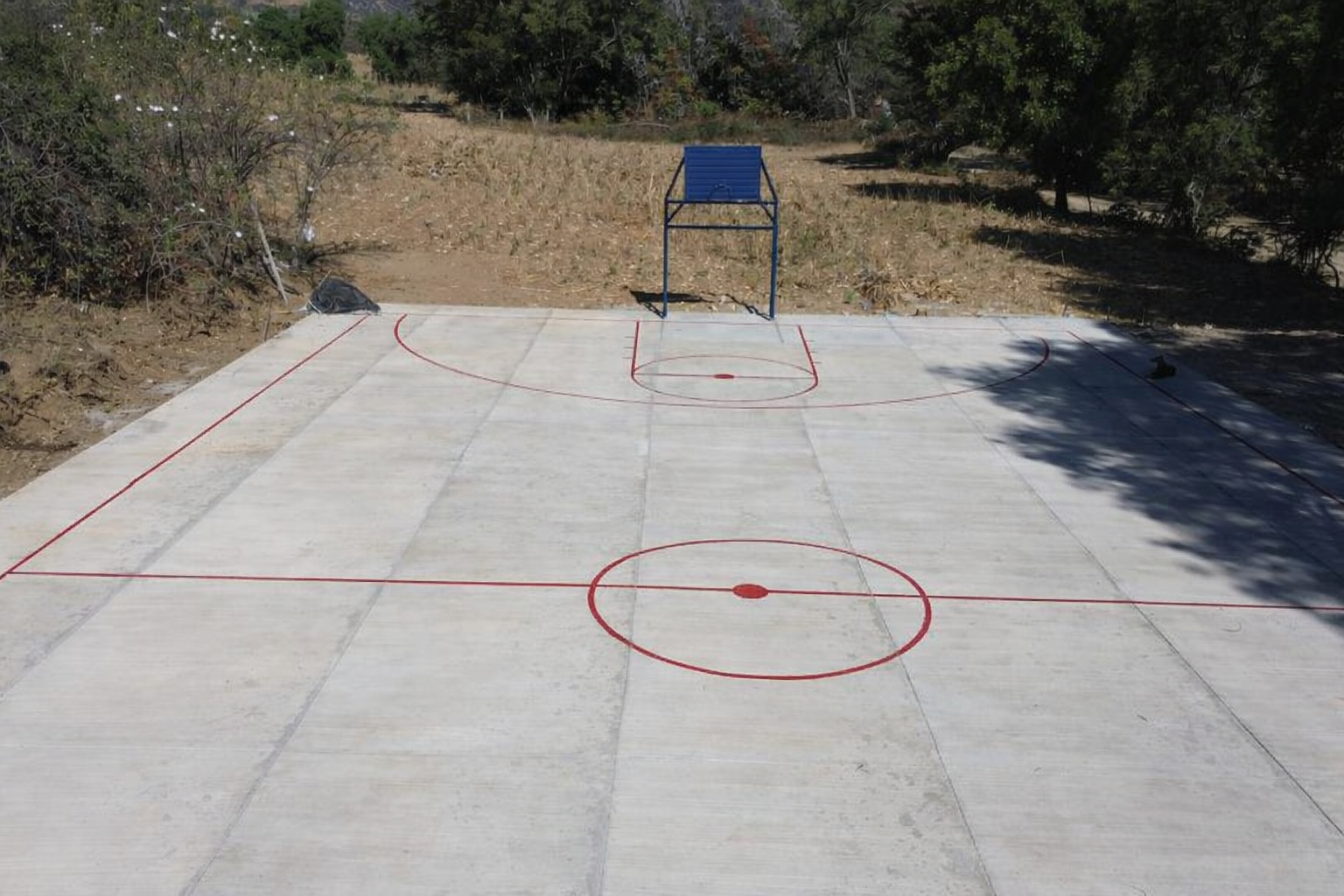CANCHA EN POZO GUAMÚCHIL (PEDREGOSO)
